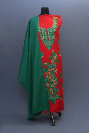 Green And Red Color Suit Having Aari Embroidery On Neck Bold Bail Pattern And Beautiful Motifs