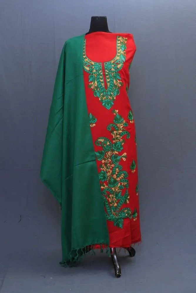 Green And Red Color Suit Having Aari Embroidery On Neck Bold Bail Pattern And Beautiful Motifs